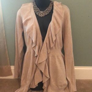 Tan ruffled cardigan with hook closure